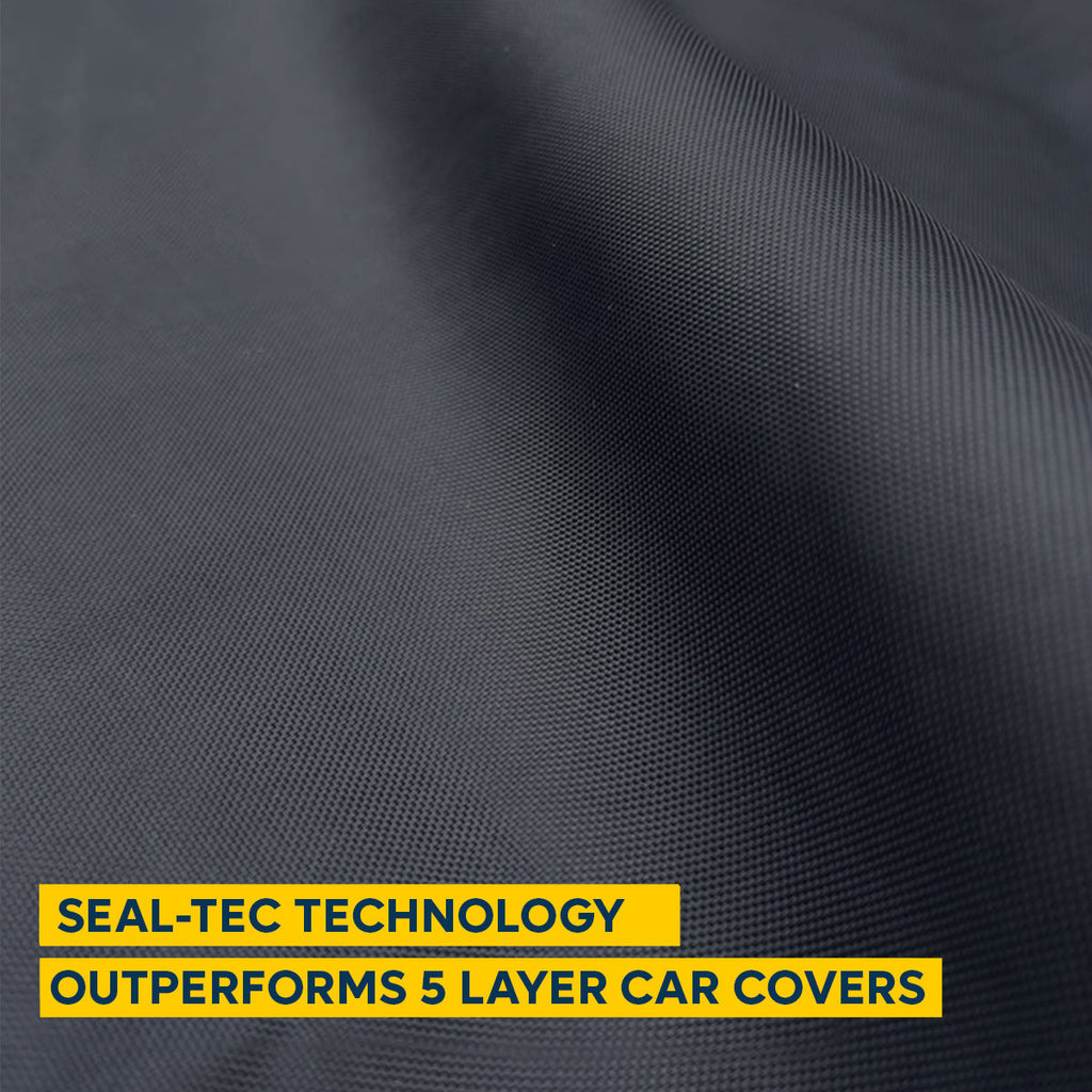 a black cover with seal-tec technology that outperfoms 5 layer car covers